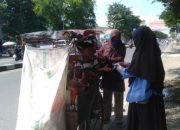PIKOM IMM FISIP Unismuh Makassar Bagi-bagi Masker