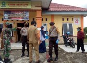 Kapolsek Sinjai Utara Pimpin Pengamanan Penyaluran Sembako