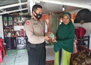 Bhabinkamtibmas Desa Pulau Harapan Bagikan Masker ke Warga Binaan
