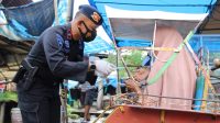 Danyon C Pelopor Himbau Masyarakat Patuhi Prokes dalam Pelaksanaan Operasi Yustisi