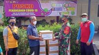 Babinsa Magelang Tengah Salurkan Bansos Bagi Warga yang Jalani Isolasi Mandiri