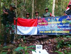 Satgas Pamtas Yonarmed 11 Kostrad Laksanakan Patroli Patok di Perbatasan RI-Malaysia