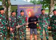 Satgas Pamtas Yonarmed 11 Kostrad Terima Penyerahan Senjata Api Rakitan