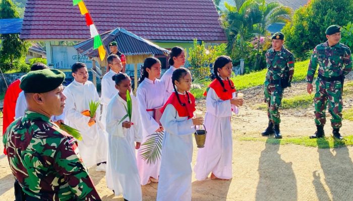 Satgas Pamtas Yonarmed 11 Kostrad Kawal Perayaan Minggu Palma