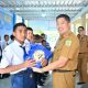 Irwan Suaib Serahkan Bantuan Sembako Siswa Kurang Mampu di UPTD SMPN 1 Sinjai